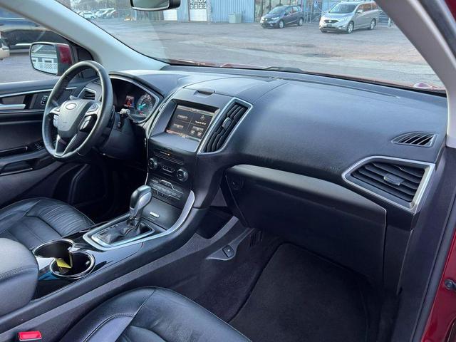 Photo of 2015 Ruby Red Metallic Tinted Clearcoat Ford Edge