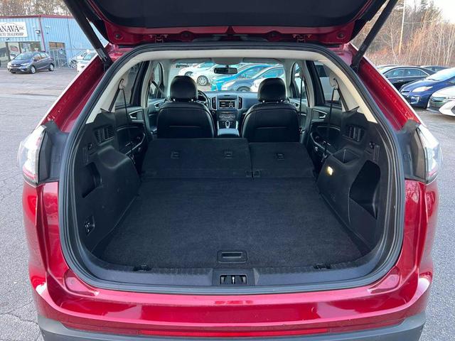 Photo of 2015 Ruby Red Metallic Tinted Clearcoat Ford Edge