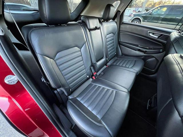 Photo of 2015 Ruby Red Metallic Tinted Clearcoat Ford Edge