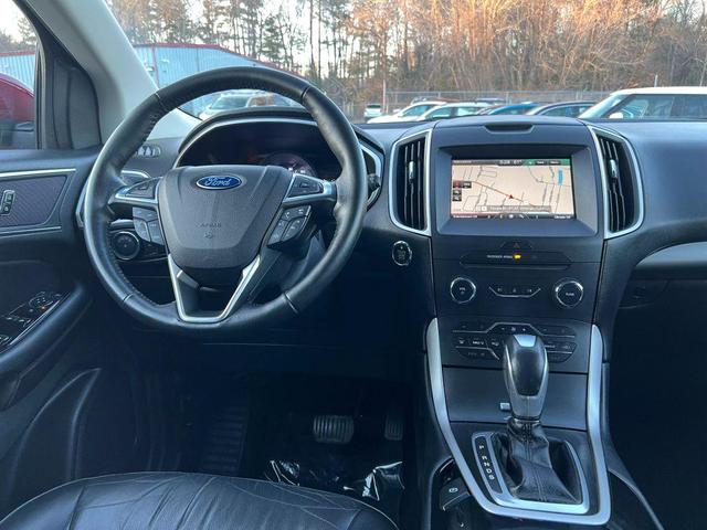 Photo of 2015 Ruby Red Metallic Tinted Clearcoat Ford Edge
