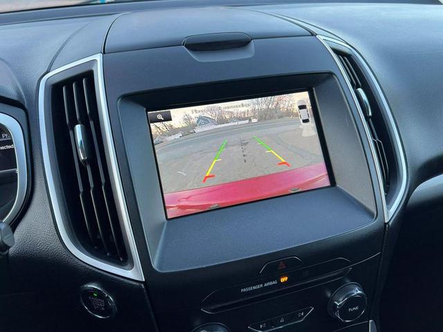 Photo of 2015 Ruby Red Metallic Tinted Clearcoat Ford Edge