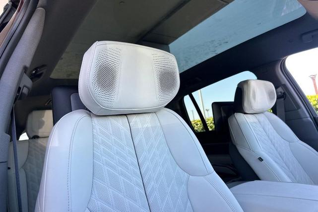 Photo of 2025 Black Cherry Cadillac Escalade IQ