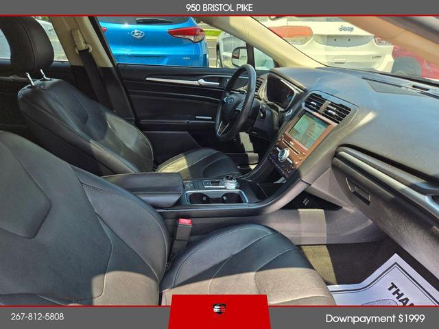 Photo of 2019 White Ford Fusion Hybrid