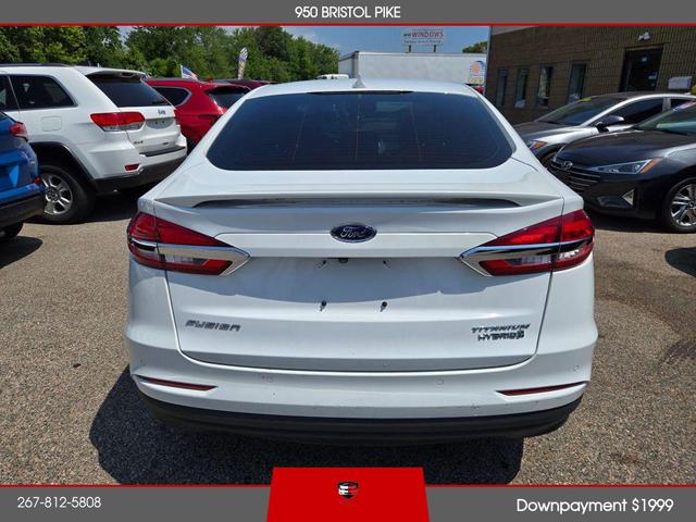 Photo of 2019 White Ford Fusion Hybrid