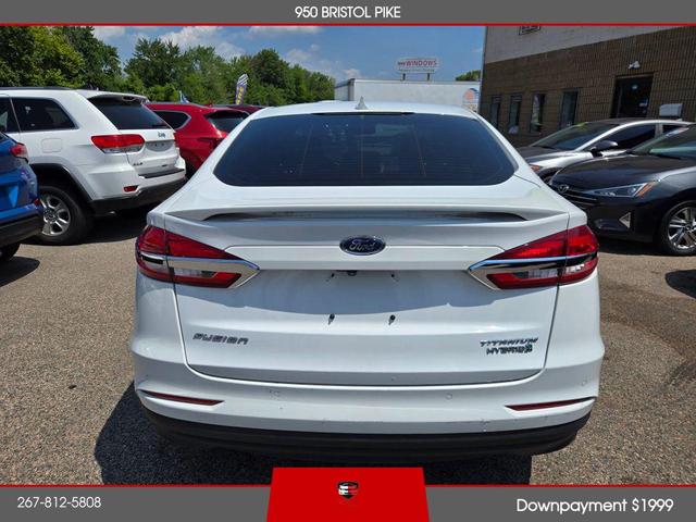 Photo of 2019 White Ford Fusion Hybrid