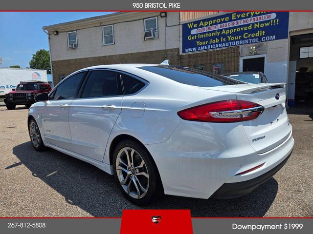 Photo of 2019 White Ford Fusion Hybrid
