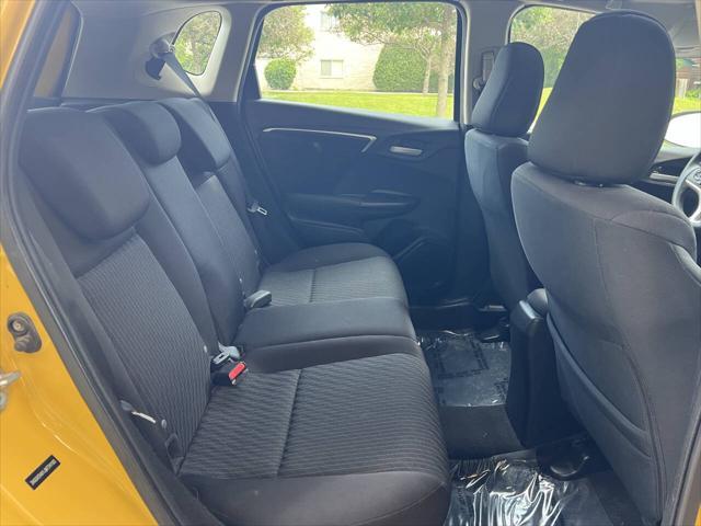 Photo of 2018 Helios Yellow Pearl Honda Fit