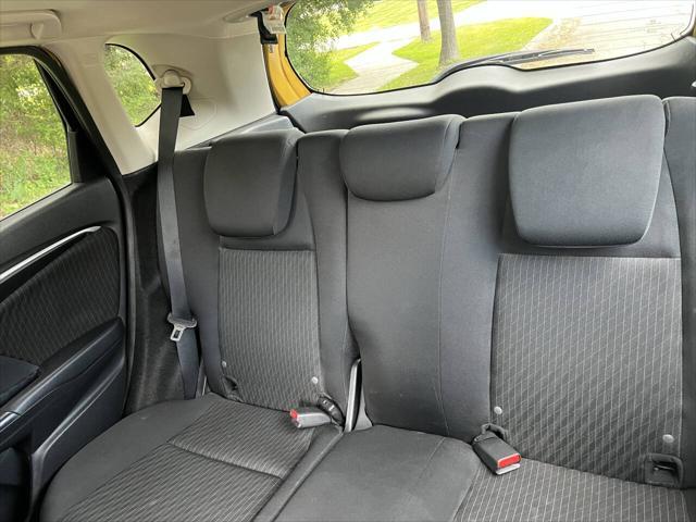 Photo of 2018 Helios Yellow Pearl Honda Fit