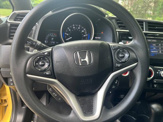 Photo of 2018 Helios Yellow Pearl Honda Fit