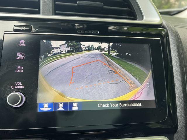 Photo of 2018 Helios Yellow Pearl Honda Fit