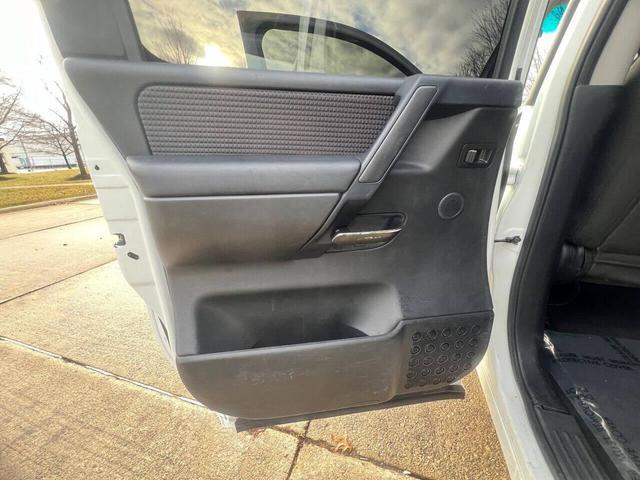Photo of 2014 Glacier White Nissan Titan