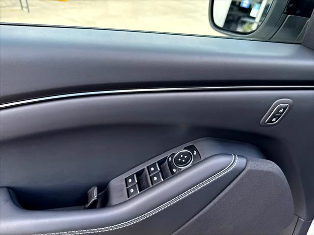 Photo of 2025 Star White Metallic Tri-Coat Ford Mustang Mach-E