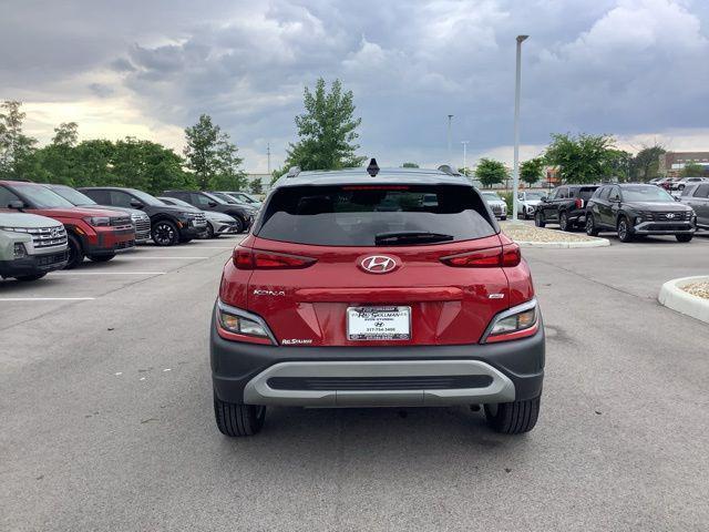 Photo of 2022 Pulse Red w/Black Roof Hyundai KONA