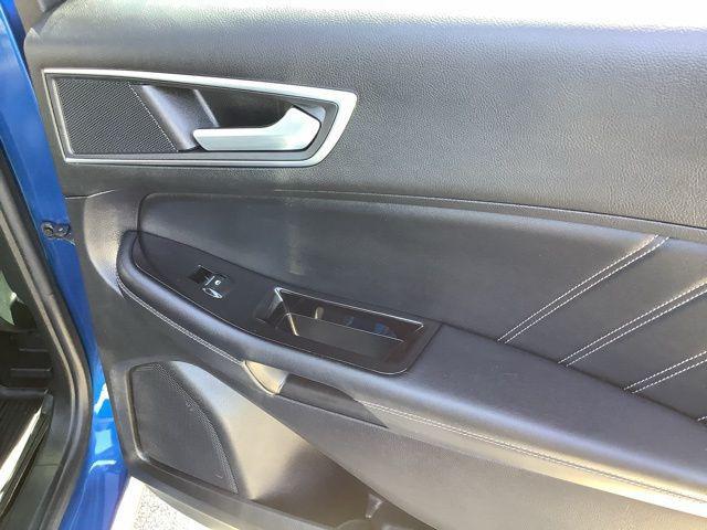 Photo of 2018 Lightning Blue Ford Edge