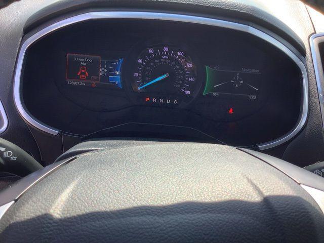Photo of 2018 Lightning Blue Ford Edge