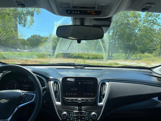 Photo of 2024 Lakeshore Blue Metallic Chevrolet Malibu
