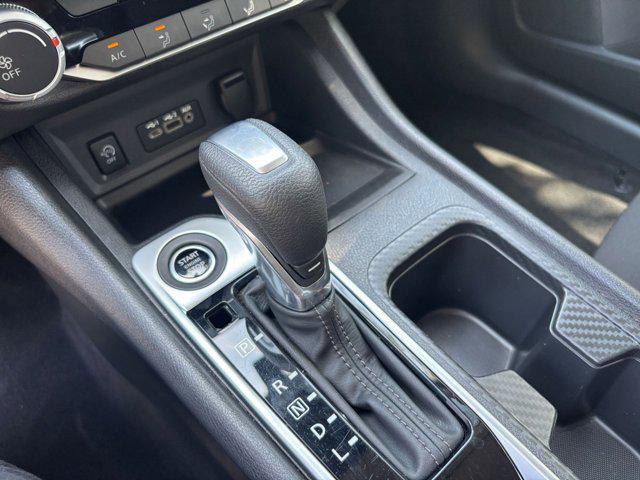 Photo of 2024 Aspen White Tricoat Nissan Sentra