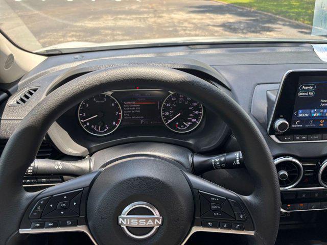 Photo of 2024 Aspen White Tricoat Nissan Sentra