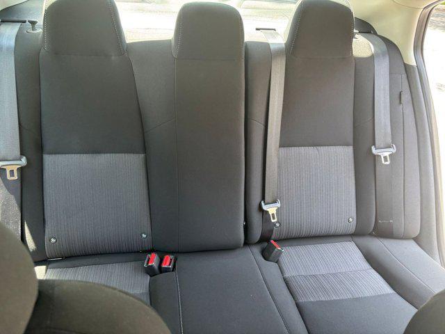 Photo of 2024 Aspen White Tricoat Nissan Sentra