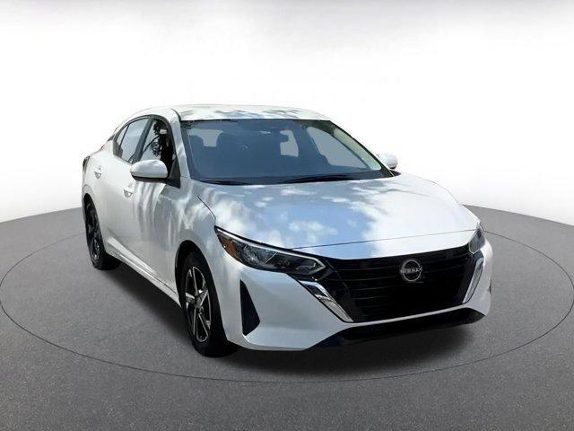 Photo of 2024 Aspen White Tricoat Nissan Sentra