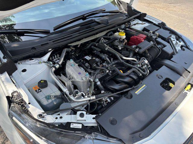 Photo of 2024 Aspen White Tricoat Nissan Sentra