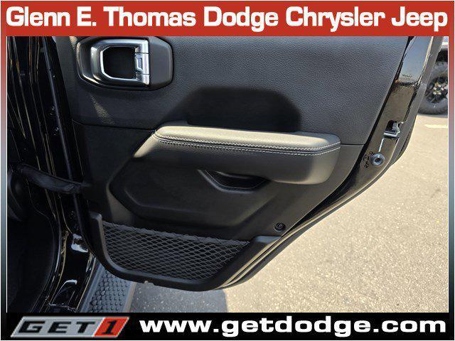 Photo of 2022 Black Clearcoat Jeep Wrangler Unlimited 4xe