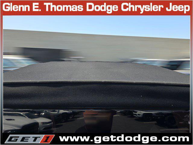 Photo of 2022 Black Clearcoat Jeep Wrangler Unlimited 4xe