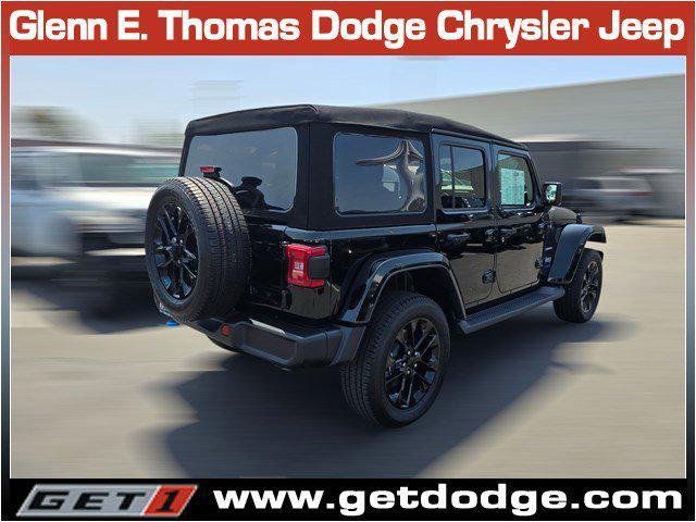 Photo of 2022 Black Clearcoat Jeep Wrangler Unlimited 4xe