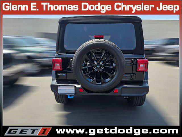 Photo of 2022 Black Clearcoat Jeep Wrangler Unlimited 4xe