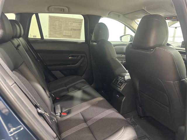 Photo of 2025 Ingot Blue Metallic Mazda CX-50 Hybrid