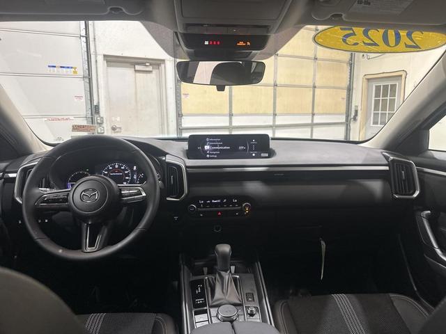 Photo of 2025 Ingot Blue Metallic Mazda CX-50 Hybrid
