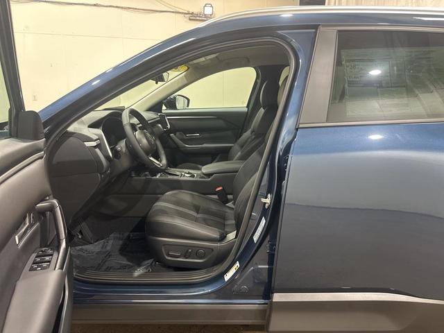 Photo of 2025 Ingot Blue Metallic Mazda CX-50 Hybrid