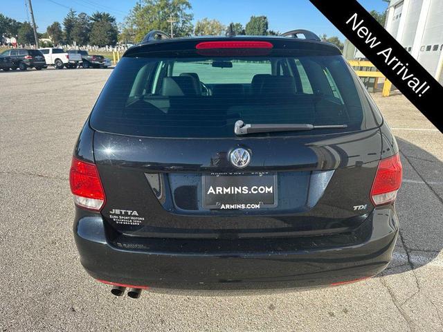 Photo of 2014 Black Uni Volkswagen Jetta SportWagen