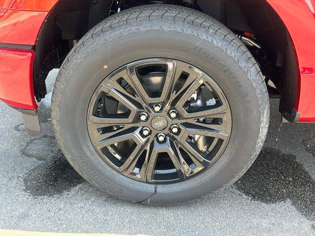 Photo of 2025 Rapid Red Metallic Tinted Clearcoat Ford F-150