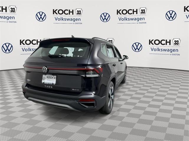 Photo of 2025 Deep Black Pearl Effect Volkswagen Taos