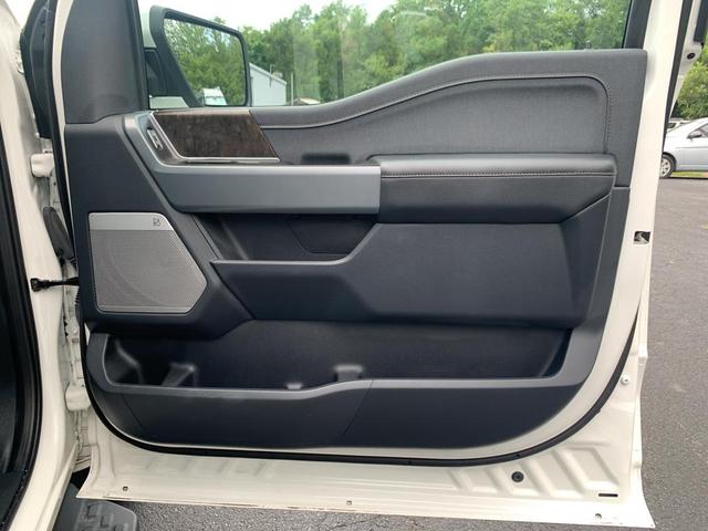 Photo of 2023 Star White Metallic Tri-Coat Ford F-150 Lightning