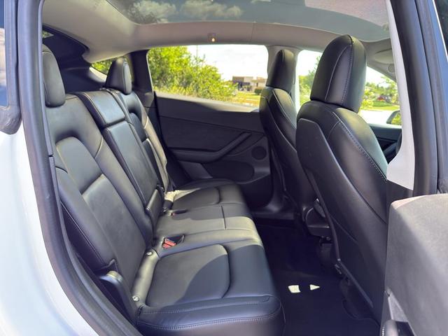 Photo of 2021 Pearl White Multi-Coat Tesla Model Y