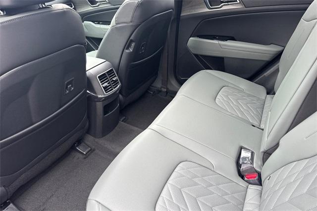 Photo of 2025 Jungle Green Kia Sportage Plug-In Hybrid