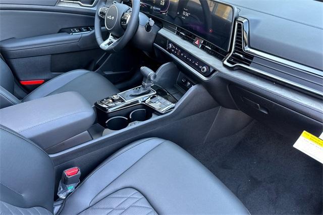 Photo of 2025 Jungle Green Kia Sportage