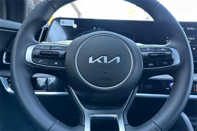 Photo of 2025 Jungle Green Kia Sportage