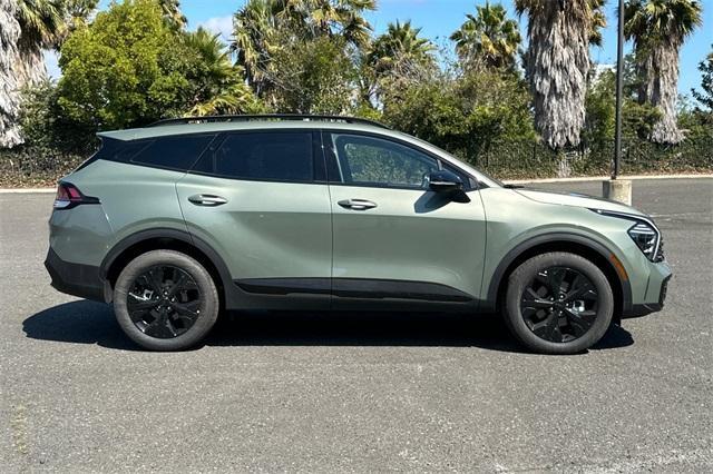 Photo of 2025 Jungle Green Kia Sportage