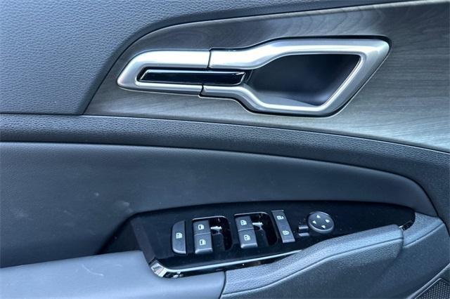 Photo of 2025 Jungle Green Kia Sportage