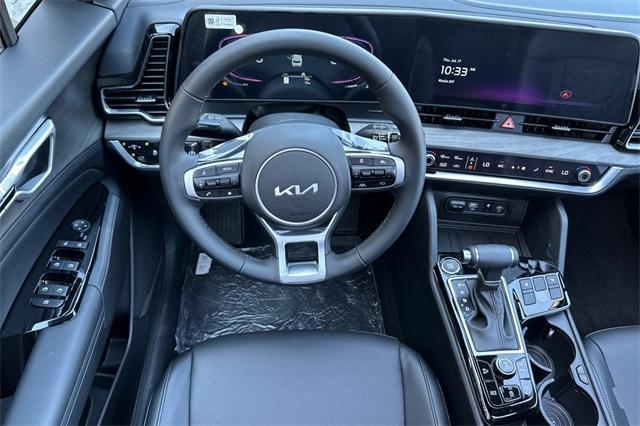 Photo of 2025 Jungle Green Kia Sportage