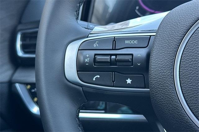 Photo of 2025 Jungle Green Kia Sportage