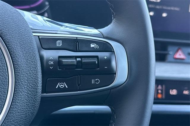 Photo of 2025 Jungle Green Kia Sportage