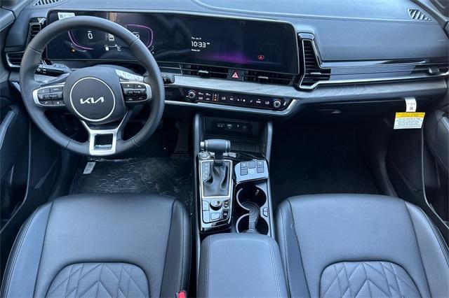 Photo of 2025 Jungle Green Kia Sportage