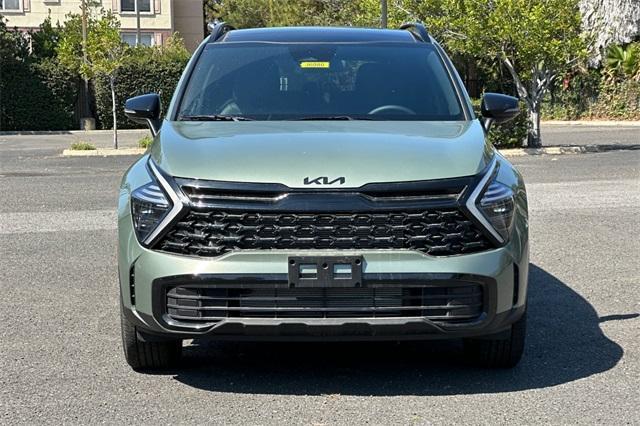 Photo of 2025 Jungle Green Kia Sportage