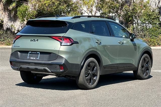 Photo of 2025 Jungle Green Kia Sportage