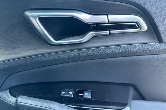 Photo of 2025 Jungle Green Kia Sportage