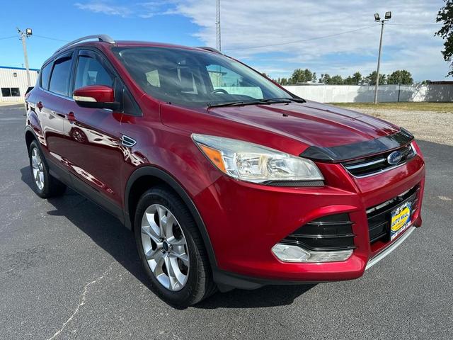 Photo of 2016 Ruby Red Metallic Tinted Clearcoat Ford Escape